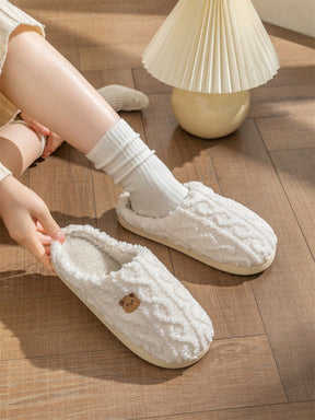 Pantufa Feminina De Tricô Com Textura Aconchegante Detalhe Desenho Caveira Com Laço